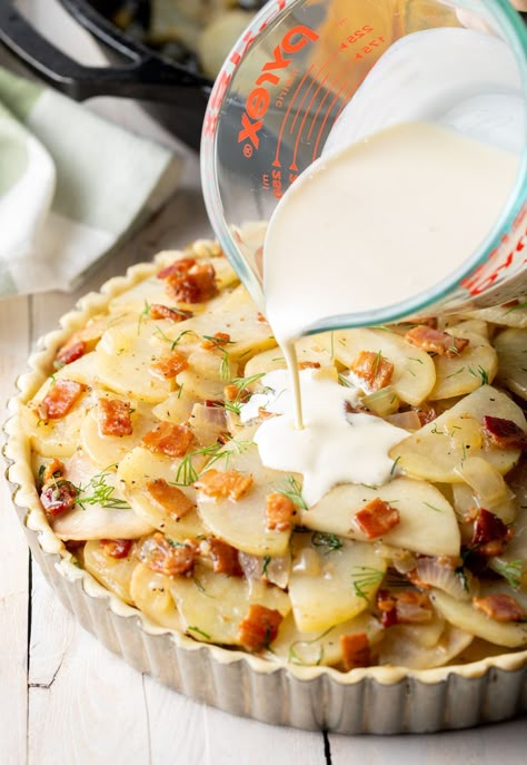 Crispy crust layered with potatoes, onions, and bacon. The Saint Patrick's Day favorite is a must have at an Irish dinner! #aspicyperspective #foodblog #foodie #instayum #hungry #thekitchn #onmytable #dailyfoodfeed #foodlove #foodpic #instafood #foodstagram #tasty #irishpotatopie #irishpotatoes #irishfood #potatoes #potatopie #scallopedpotatoes #dinner Irish Potato Pie Recipe, Irish Potato Pie, Irish Dinner Recipes, Irish Meals, Irish Dinner, Irish Foods, Potato Pie Recipe, Irish Cooking, Irish Potato