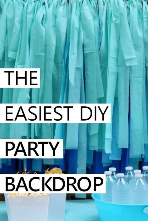 how to make an easy and inexpensive party backdrop with plastic tablecloths Table Cloth Strip Backdrop, How To Make Backdrop With Table Covers, Photo Backdrop With Tablecloths, Dollar Tree Tablecloth Backdrop, Diy Blue Backdrop, Tablecloth Ideas Party, Party Backdrop Without Balloons, Dollar Tree Party Backdrop, Garland Made From Plastic Tablecloths