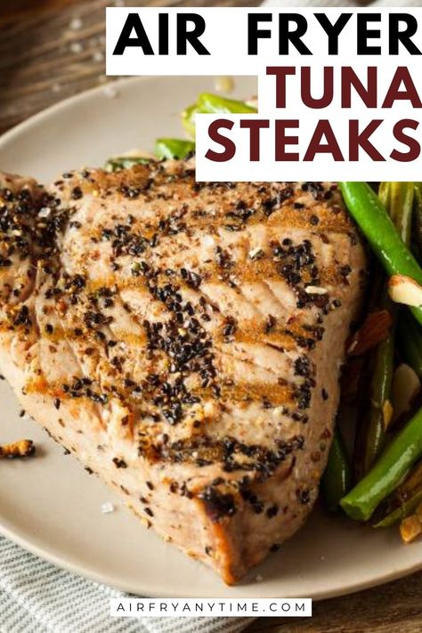 Deliciously juicy and flavorful air fryer tuna steaks! 🐟🔥 Perfectly crispy on the outside and tender on the inside, these gourmet tuna steaks are a must-try for seafood lovers. #airfryerrecipes #tunasteaks #seafoodlover #easycooking Tuna Steaks Recipes Air Fryer, Fresh Tuna Steak Recipes Air Fryer, How To Cook Tuna Steak In Air Fryer, Airfry Tuna Steaks, Tuna Steak Air Fryer Recipes, Cooking Tuna Steaks On Stove, Air Fryer Tuna Steaks, Airfryer Tuna Steak, Ahi Tuna Air Fryer