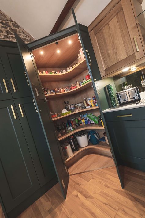 Included in the addition of the tall cabinets is the angled walk-in corner larder that, because of its height, has added levels of food storage and, with built-in electrical sockets, perfectly conceals the microwave. Read more about our customers journey at System Six Kitchens. Tall Units In Kitchen, Corner Larder, Kitchen Corner Units, Corner Pantry Cabinet, Kitchen Larder Units, Kitchen Timeless, Tall Corner Cabinet, Tall Cabinets, Tall Kitchen Cabinets