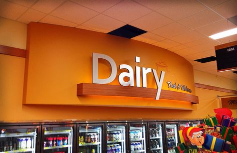 Interior Dairy Area | Grocery Store Design | Decor Design Upgrade | Dairy Section Décor | Market Interior Upgrade by I-5 Design & Manufacture Dairy Shop Interior Design, Dairy Shop, Wooden Valance, Market Interior, Milk Dairy, Grocery Store Design, Tiny House Nation, Super Market, Urban Modern