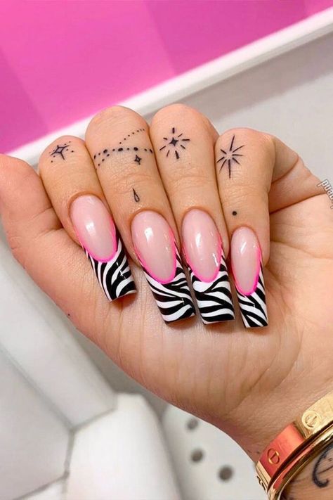 These zebra print nails are SO HOT! We especially love the color combo @Chaunlegend used to create these zebra print French tip nails. This look was built with Kiara Sky products: Black To Black + Pink Passport + Pure White. Tap the photo to see more of our favorite examples of colored french tip nails! Hot Pink And Zebra Nails, Zebra And Pink Nails, Hot Pink Zebra Print Nails, Hot Pink Zebra Nails, Nail Zebra Designs, Zebra Nails Animal Prints, Zebra Nails Pink, Zebra Nails Acrylic, Pink Zebra Print Nails