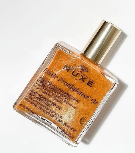 ° Nuxe Prodigieuse Multi-Purpose Dry Oil Happy Wednesday! Featuring one of my favorite oils from @nuxe love using this one for my hair and body & you can't go wrong with a little bit of shimmer during these times! Have you tried the Nuxe products? Tell me your favourite in the comments. #nuxe #bodyproducts #bodycare #haircare Shimmer Body Oil, Dry Oil, Botanical Oils, Happy Wednesday, Have You Tried, Body Oil, My Hair, You Tried, Tell Me