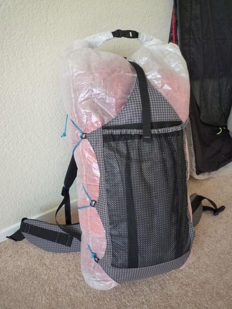 Well, inspired by Chris Zimmer's great packs, and with a lot of his help (especially with regards to creating nice shoulder straps), I built my first pack. Basically, I wanted... Backpack Modifications, Myog Backpack, Ultralight Camping Gear, Diy Backpack Pattern, Backpack Inspiration, Backpacking Backpack, Dry Bag Backpack, Sail Bag, Camping Set Up