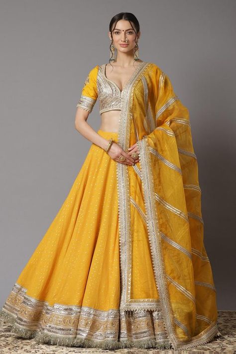 Buy Yellow Brocade Woven Mughal V Neck Lehenga Set For Women by BAARO MASI Online at Aza Fashions. Chanderi Lehenga, Haldi Outfits, Yellow Lehenga, Wedding Lehenga Designs, Lehenga Designs Simple, Green Lehenga, Blue Lehenga, Gaun Fashion, Indian Dresses Traditional