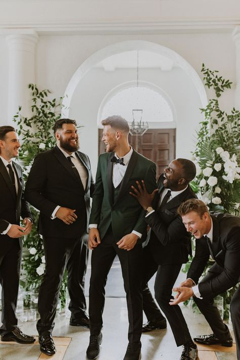 Green Bowtie Wedding, Formal Wedding Groomsmen, Classy Groom Suit, Black And Emerald Groomsmen, Sage Green And Black Tux Wedding, Groom Wedding Suit Black, 4 Groomsmen Photos, Black And Green Suit Wedding, Green Suit Wedding Groomsmen