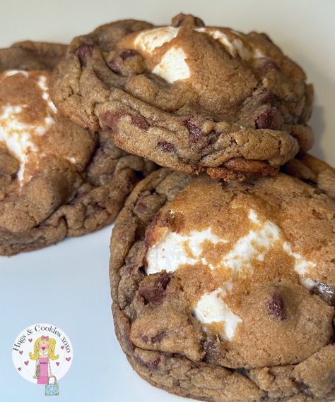 Browned Butter S'mores Stuffed Cookies Browned Butter S'mores Stuffed Cookies 16 T. salted butter (browned in a skillet)1 cup dark brown sugar1/2 cup light brown sugar1/2 cup granulated sugar2 eggs2 1/2 tsp Vanilla2 1/4 cups all-purpose flour3/4 tsp salt3/4 tsp baking soda1/2 tsp baking powder1 tsp cornstarch8 oz semi-sweet chocolate chipsStuffing Ingredientsgraham crackerssnack size Hershey Barsregular sized marshmallows Preheat your oven to 350°FLine a baking sheet with parchment paper.Once S’mores Stuffed Cookie, Stuffed Smores Cookies, Smores Stuffed Cookies, Marshmallow Stuffed Cookies, Graham Cracker Snacks, Smores Cookies Recipes, Hugs Cookies, Smores Cookie, Apple Cider Vinegar Detox Drink