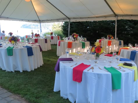 Multi- colored napkins add a fun pop of color to a white table. Love it! #rainbownapkin #napkinfold #wedding #weddingcatering #weddingdecor #whitelinen #snuffins #snuffincatering #weloveweddings Rainbow Wedding Centerpieces, Colorful Table Decor, Linen Napkins Wedding, Pop Art Party, Multicolor Wedding, Wedding Tablecloths, Spring Brunch, Tea Party Theme, Rainbow Wedding