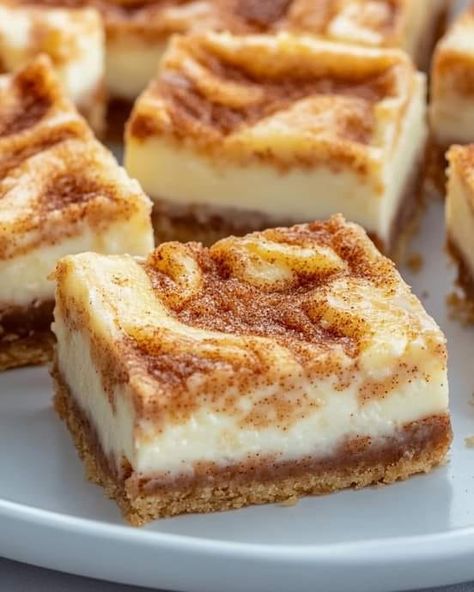 Grandma's Secret Recipes | Cinnamon Roll Cheesecake Bars 😍 | Facebook Blender Cheesecake, Cinnamon Roll Bars, Cinnamon Roll Cheesecake Bars, Island Pecan Pie, Cheesecake Cinnamon, Roll Cheesecake, Cinnamon Roll Cheesecake, Bowl Party Food, Cinnamon Butter