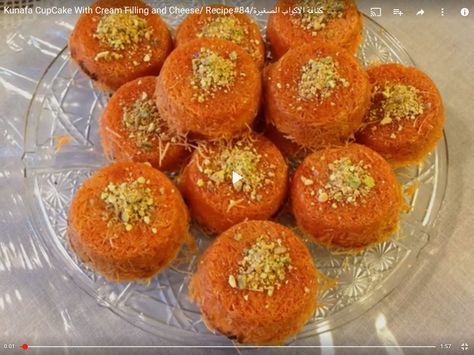 Orange Kunafa Cupcake With Green Pistachios topping. This looks delicious! Kunafa Recipe, Eid Sweets, Lebanese Desserts, Ramadan Desserts, Arabic Desserts, Middle Eastern Desserts, Arabian Food, Reception Food, Arabic Sweets