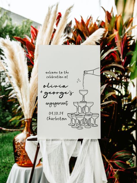 Welcome to our quirky champagne tower Bridal Shower Invitation!  Celebrate in style with our charming hand-drawn champagne glass and whimsical illustrations, paired with delightful handwritten fonts. Whether you're planning a birthday bash, wedding, bridal shower, bachelorette party, or any special event, this invitation sets the perfect tone. 🗣️ Try Before You Buy! Visit https://templett.com/design/demo/ohlillydesigns/ 26449026,26449082,26449094,26449096 Customize effortlessly to match your th Whimsical Engagement Party, House Engagement Party Ideas, Engagement Party Ideas Decorations, Champagne Engagement Party, Scribble Illustration, Engagement Party Welcome Sign, Engagement Party Sign, Lilly Party, Bachelorette Signs