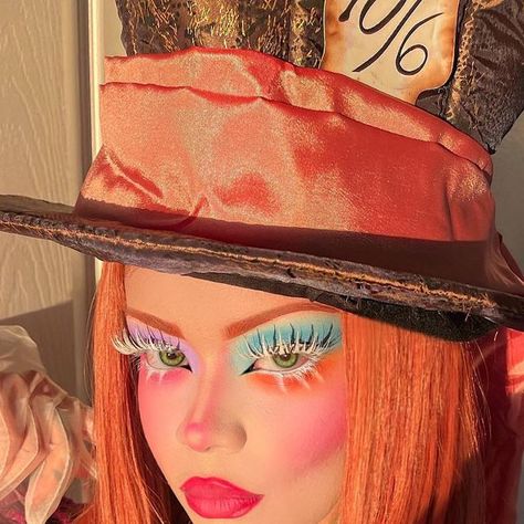 Stenie on Instagram: "We’re all quite mad here! You’ll fit right in …🫖🎩🪞🧡  🌳  Costume @dollskill <3" Mad Hatter Black Woman, Female Mad Hatter Makeup, Easy Mad Hatter Makeup For Women, Mad Hatter Inspired Makeup, Halloween Characters Costumes, Colorful Wig Costume Ideas, Creative Costumes Women, Mad Hatter Makeup For Women, Mad Hatter Female