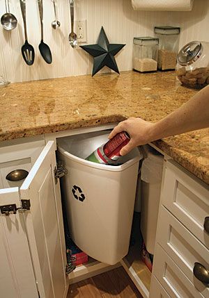 Refuse rotation. The triangular bins of the KV recycling center rotate into the corner-cabinet opening, clearing the countertop enough to insert whatever it is you need to throw away. Photo by: Debra Judge Silber Blind Corner Cabinet Solutions, Kitchen Corner Cabinet Ideas, Corner Cabinet Solutions, Kitchen Corner Storage, Blind Corner Cabinet, Corner Kitchen Cabinet, Kitchen Addition, Kitchen Blinds, Recycling Center