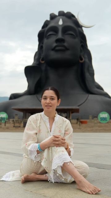 Isha Foundation on Instagram: "#Repost @tamannaahspeaks • • • • • • Like @sadhguru ji said, “Enlightenment happens quietly, like the blossoming of a flower.” As I delve deeper into my journey of exploration, his learnings and guidance play a huge part. The time I spent at ISHA Yoga center was transformational in more ways than one. Today September 23rd being his Enlightenment Day, is yet another reminder of how we should live every day with the same gusto and energy. Make every day your best Isha Yoga Photo Poses, Isha Foundation Photoshoot, Mandir Poses For Women, Adiyogi Shiva, Isha Foundation, Elegant Pose, Yoga Trapeze, Isha Yoga, Temple Photography