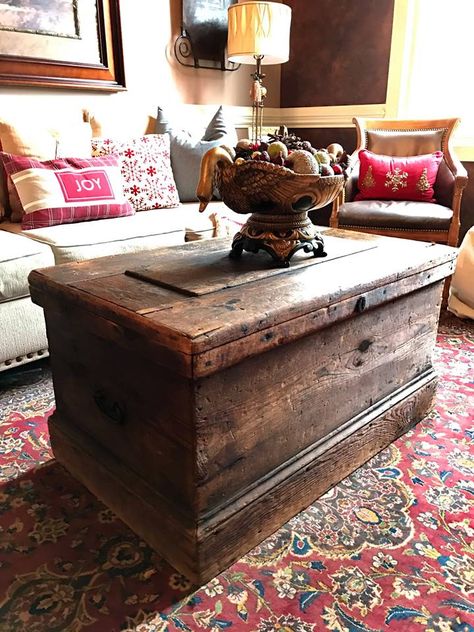 Antique wood trunk or chest used as a coffee table in a living area. Beautiful! Rustic farmhouse style! Chest For Coffee Table, Wood Trunk Coffee Table, Living Room Trunk, Antique Chest Coffee Table, Trunk For Coffee Table, Rustic Living Room Coffee Tables, Chest As Coffee Table, Cedar Chest Coffee Table, Trunk As Coffee Table