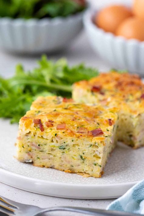 Super easy zucchini slice, made from scratch. Featuring grated zucchini, cheese, bacon and onion in a light egg base, this classic Aussie recipe is versatile, freezer-friendly and made in just one bowl. It’s also great eaten hot or cold, making it perfect for lunchboxes, light lunch, afternoon tea or dinner. Easy Zucchini Slice, Custard Slice, Savoury Slice, Cannelloni Recipes, Pie Fillings, Easy Cakes, Slice Recipe, Aussie Food, Zucchini Slice