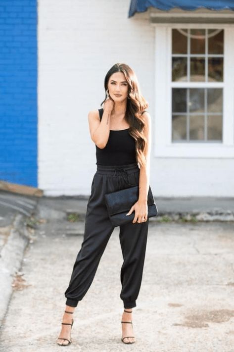 19 Jogger Pants Outfits | How to Style Joggers for Women Black Jogger Pants Outfit, Jogger Pants Outfit Dressy, Satin Joggers Outfit, Black Satin Pants Outfit, Jogger Pants Outfit Women, Womens Joggers Outfit, Satin Pants Outfit, Black Joggers Outfit, Semi Formal Mujer