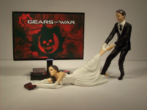 that idea is super cute! Funny Wedding Cake Topper, Gears Of Wars, Safe The Date, Video Game Wedding, Zelda Wedding, Gamer Wedding, Funny Wedding Cakes, Funny Wedding Cake Toppers, Disney Wedding Cake