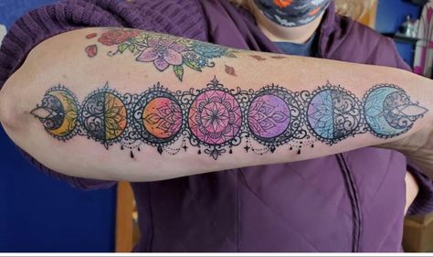 Moon Phase Chakra Tattoo, Moon Phase Sleeve Tattoo, Chakra Color Tattoo, Chakra Moon Phases Tattoo, Lunar Phases Tattoo, Moon Phases Tattoos, Chakra Tattoo Ideas Spirituality, Fold Tattoo, Rustic Tattoos For Women