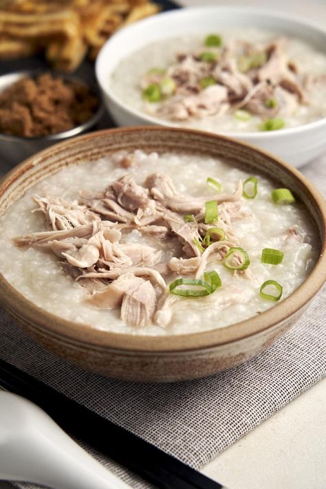 The BEST Slow Cooker Chicken Congee! This is an easy slow cooker recipe for Chinese rice congee, also called jook. Learn how to cook Chinese rice porridge in a slow cooker. Get the recipe on www.theworktop.com. || #slowcooker #congeerecipe #theworktop Chicken Porridge Chinese, Congee In Rice Cooker, Congee Crockpot, Crockpot Congee, Vietnamese Congee, Chinese Congee, Creamy Porridge, Chicken Congee, Congee Recipe