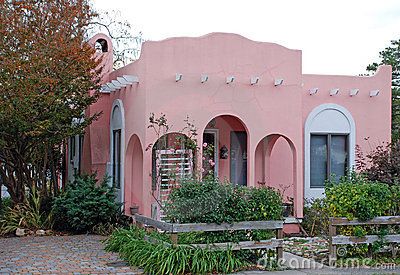 Pink Adobe House 16 by Harperdrewart, via Dreamstime Mexican House Exterior, Stucco Exterior Colors, Spanish House Exterior, Construction Fence, Mission Style Homes, Small House Exterior, Spanish Bungalow, Adobe House, Casas Coloniales