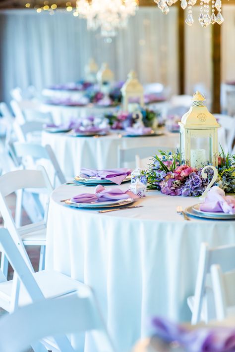 Colorful pink, blue and purple vintage inspired wedding table decor at the Carriage House Stable | Photographer: Brittany Morgan Photography | Venue: Cross Creek Ranch | #crosscreekranchfl #ccrweddings #carriagehousestable #colorfulvintagewedding #vintagewedding #colorfulwedding Pink Purple And Blue Wedding Decor, Light Blue Purple And Pink Wedding, Lavender And Light Blue Wedding Decor, Blue And Purple Table Decorations, Blue And Purple Wedding Table Decor, Blue And Purple Table Setting, Lavender Pink And Blue Wedding, Dusty Blue And Lavender Wedding Wedding Table Decor, Lilac And Blue Wedding Decor