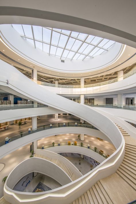 Chongqing Real Estate College Library PH Alpha Design Skylight Library, Library Skylight, University Library Design, Futuristic Library, Library Stairs, Library Interior Design, Alpha Design, Library Plan, Atrium Design