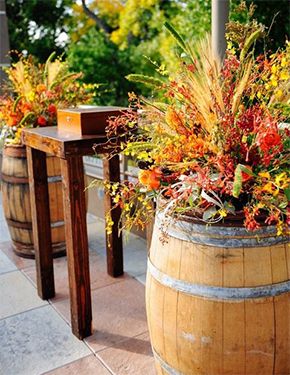 Get inspired by these beautiful fall gardens and learn how to add that autumn glow in your own garden! Fall Wedding Ceremony Decorations, Wine Barrel Wedding, Fall Patio, Wooden Barrels, Barrel Wedding, Fall Garden Wedding, Fall Wedding Ceremony, Autumn Wine, Garden Weddings Ceremony