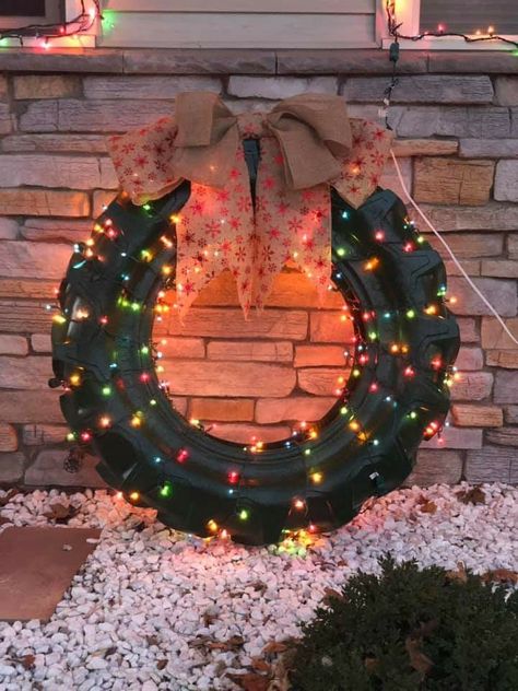 Tractor tire outdoor Christmas decor. So doing it next year! Old Tires Christmas Ideas, Tractor Tires Repurposed, Tractor Tires Ideas, Truck Tire Ideas, Tractor Tire Christmas Decoration, Tractor Tire Wreath Christmas, Tire Decor Ideas, Tractor Tyre Ideas, Christmas Tires Decoration