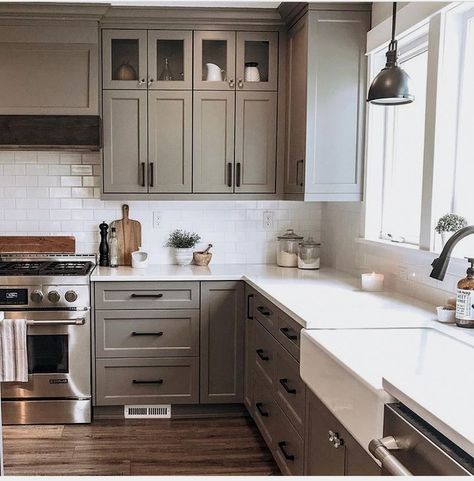 #farmhousehomedecor #rustic #farmhouseideas #farmhouse Taupe Kitchen Cabinets Dark Floors, Modern Farmhouse Painted Cabinets, Taupe Tiles Kitchen, Neutral Kitchen Black Hardware, Modern Ranch Style Homes Interior Decor Kitchen, Grayge Color Kitchen, Kitchen Schemes Ideas, Kitchen Cabinet Color Ideas Minimalist, Kitchen Cabnit Color