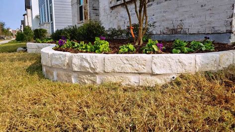 Brick Around Flower Bed, Stone Flower Beds In Front Of House, Raised Stone Flower Beds In Front Of House, Raised Flower Beds Front Yard, White Brick Flower Bed Border, Bricks Around Flower Bed, Front Yard Landscaping Brick Border, Brick Flowerbed Border, Stone Garden Beds Landscaping