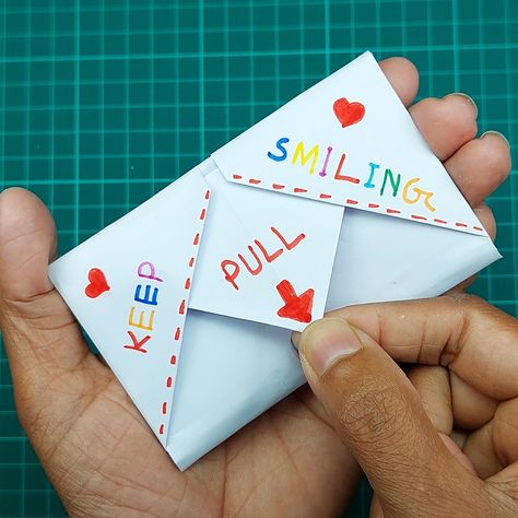 Valentine's Day Paper Gift Card Without Glue or Tape😍 | origami, craft, gift card | Watch how to make a pull tab origami paper gift card for upcoming valentine's day 2022. You can gift this unique craft for your girlfriend or boyfriend.... | By Creative Art & Craft Ideas Origami Gifts For Girlfriend, Origami For Girlfriend, Pull Tab Cards, Diy Gifts Paper, Art Craft Ideas, How To Make Letters, Diy Gifts For Girlfriend, Barbara Kruger, S Letter Images