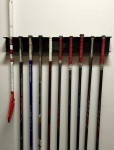 Hockey Stick Storage Ideas, Hanging Hockey Sticks On Wall, How To Hang Hockey Sticks On Wall, Hockey Stick Rack Diy, Hockey Stick Organization, Hockey Stick Storage Diy, Hockey Stick Holder Diy, Hockey Gear Storage Ideas, Hockey Stick Rack