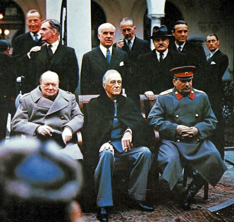 February 1945: The "Big Three" at the Yalta Conference. Seated from left to right are Prime Minister Sir  Winston Churchill, President Franklin D. Roosevelt and Soviet Premier Josef Stalin. Soviet Foreign Minister Vyacheslav M. Molotov is seen standing behind Stalin. Winston Churchill Photos, Vladimir Lenin, The Big Three, Franklin Delano Roosevelt, Joseph Stalin, Ww2 Photos, British Prime Ministers, Big Three, History Pictures