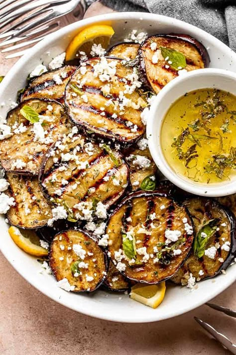 This healthy Grilled Eggplant with Garlic Vinaigrette is the vegetable side dish you need in your life! Tender eggplant slices are smothered in a savory garlic dressing and topped with crumbles of feta cheese. #grilledeggplant #eggplants #easysidedish Fruit And Vegetable Recipes, Grilled Eggplant Recipes, Grilled Side, Eggplant Side Dishes, Best Eggplant Recipe, Summer Potluck Recipes, Garlic Vinaigrette, Grilled Side Dishes, Eggplant Recipes Easy