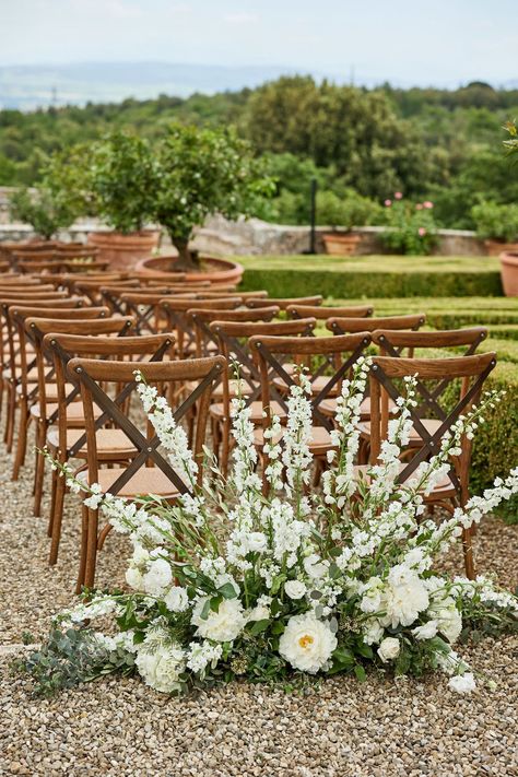 Friends and family found their seats for the elegant alfresco ceremony in the castle gardens, which were decorated with arrangements of ivory blooms accented w… Ceremony Entrance Flowers, Aisle Flowers Wedding Walkways, Ceremony Entrance Decor, Wedding Ceremony Entrance, Entrance Flowers, Seafoam Wedding, Outside Wedding Ceremonies, Ceremony Entrance, Wedding Walkway