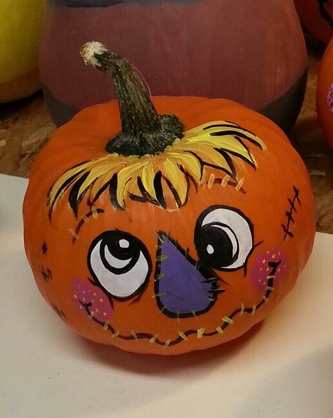 Scarecrow pumpkin Pumpkin Painting Ideas Scarecrow, Scarecrow Pumpkin Painting Ideas, Wonky Donkey Pumpkin, Scarecrow Painted Pumpkin, Pumpkin Faces Ideas Cute Painted, Scarecrow Pumpkin Ideas, Painted Faces On Pumpkins, Easy Halloween Pumpkin Painting, Pumpkin Painting Thanksgiving