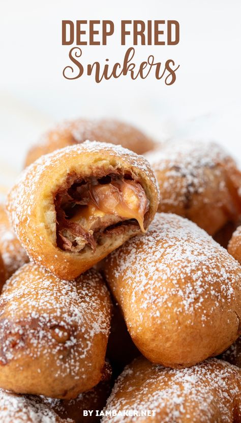 A pile of deep fried snickers.  The top dessert has a bite taken from it, showing the candy center. Deep Fried Snickers, Fried Snickers, Fried Twinkies, Deep Fried Desserts, Easy Impressive Dessert, Fair Foods, Morning Recipes Breakfast, Fried Dessert, State Fair Food