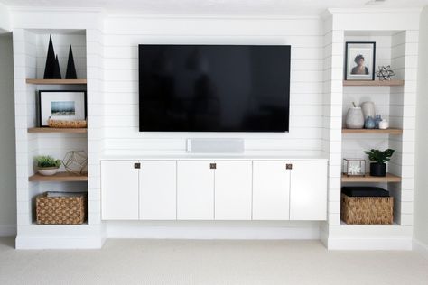 DIY Built-ins & Faux Shiplap - Benjamin Moore Simply White (soft and subtly creamy white). Built In Tv Unit, Built In Tv Wall Unit, Alcove Shelving, Ikea Built In, Built In Entertainment Center, Diy Shiplap, Faux Shiplap, Flat Screen Tv, Entertainment Center Decor