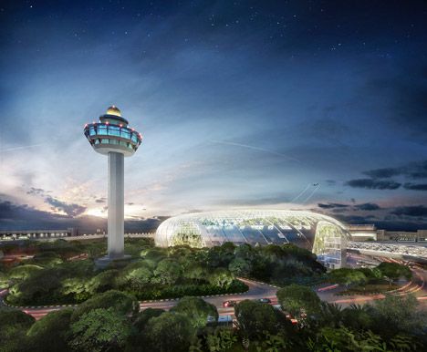 Changi Airport in Singapore by Safdie Architects The route to the new building will be nestled behind the three terminals of the existing airport, which processes over 53 million passengers a year. It will connect to Terminal 1 with an expansion of the existing arrivals hall, and to Terminals 2 and 3 via new footbridges. Airport Architecture, Jewel Changi Airport, Changi Airport Singapore, Moshe Safdie, Singapore Changi Airport, Changi Airport, Indoor Waterfall, Airport Design, Weird And Wonderful