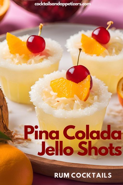 These are the Best Pina Colada Jello shots! Fun and easy to make, the rum jello shots are made with Coconut rum and pineapple jello. Top with white coconut and a cherry garnish. If you like a classic Pina Colada drink, you'll love these boozy shots! Pina Colada Theme Party, Boozy Pina Colada Bites, Shots With Coconut Rum, Coconut Rum Jello Shots, Pina Colada Drink, Pina Colada Jello Shots, Rum Jello Shots, Best Rum Cocktails, Summer Mixed Drinks