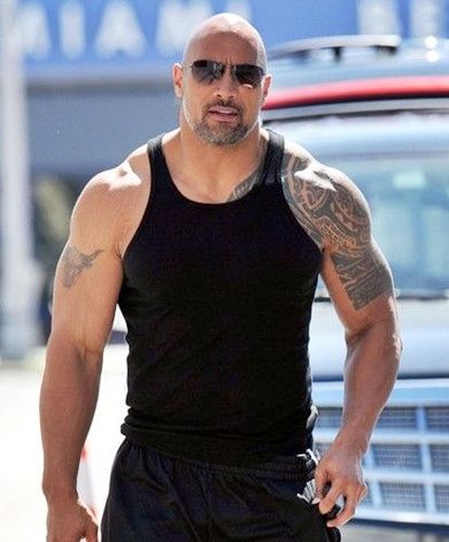 Dwayne Johnson the Rock in a Tank Top showing off his Muscles Dwayne Johnson Family, Dwyane Johnson, Bald With Beard, Going Bald, Rock Johnson, The Rock Dwayne Johnson, Johnson Family, Michelle Rodriguez, Dwayne The Rock