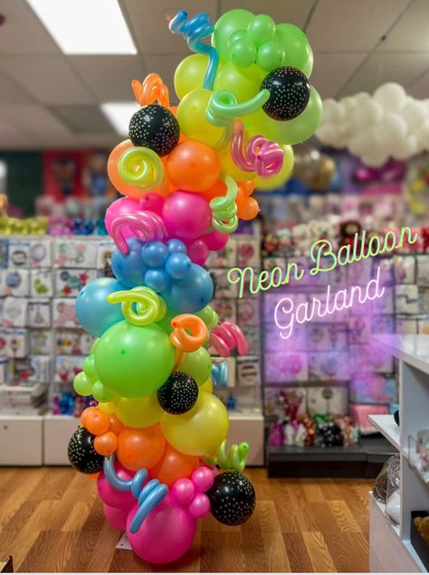 Neon balloon garland  comes in 5in,11in, 18in Neon colors  Comes with Latex printed balloons and a  mix of balloons and 260 balloons   The 260 balloons (long balloons)   come in different neon colors. * Balloons glow in dark  * Outside/ Inside use  ** We recommend our electric pump to blow our balloons, we also recommend the hand pump to make Balloon  swirls* 4ft Balloon Garland  7ft Balloon Garland  9ft Balloon Garland ( the height is like photo)  12ft Balloon Garland Neon Ballons Decoration, Dark Balloon Garland, Colors Theme Party, Neon Balloon Garland, Neon Balloon Arch, 260 Balloons, Neon Balloons, Garland Party Decor, Cheers Theme