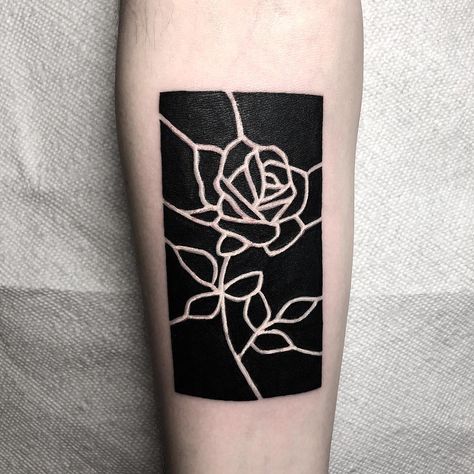 Blackwork stained glass rose by Martin Kelly at Body Electric in Hollywood CA Black Square Tattoo Design, Negative Space Cover Up Tattoo, Solid Black Tattoo Cover Up, Small Blackout Tattoo, Blackwork Tattoo Coverup, Black Square Tattoo, Tatuaje Cover Up, Square Tattoo, Siren Tattoo