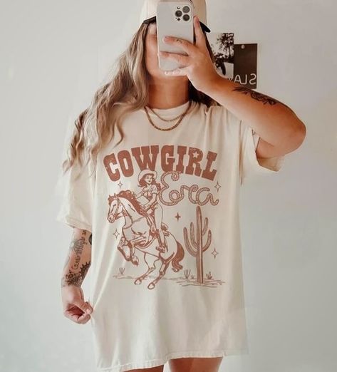 I’m a Cowgirl baby! Country Graphic Tees, Cowgirl Era, Cowgirl Baby, Western Graphic Tees, Popular Designs, Dtf Transfers, The Space, Tee Design, Concert Outfit