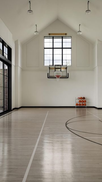 Studio McGee on Instagram: "The #SMWatersEdge basement has a theatre room, gaming room, gym, and a sport court that’s filled with the most beautiful natural light. It’s the kind of basement you never want to leave! Builder: @killowenconstruction Architect: @think_architecture" Room Gaming, Room Gym, Basement Family Room, Sport Court, Theatre Room, Studio Mcgee, Gaming Room, Game Room, Natural Light