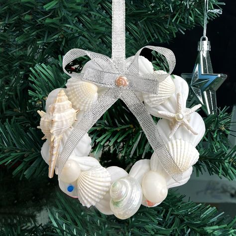 PRICES MAY VARY. Natural Shell Christmas Ornaments: Elevate your Christmas tree with our exquisite handmade ornaments crafted from natural shells. These unique shell crafts will add a touch of elegance and create a distinctive Christmas atmosphere. Easy to Use: Each seashell Christmas tree ornament comes with a ribbon for easy hanging. No tools or complicated installation required. Simply hang them wherever you desire to add a charming coastal touch to your Christmas decorations. Creative Handma Gifts With Seashells, Shells Christmas Decorations, Capiz Christmas Ornaments, Fun Easy Crafts Christmas, Homemade Beach Christmas Ornaments, Resin Sea Shell Crafts, Shell Stepping Stones, Christmas Seashell Ornaments, Coastal Winter Decor