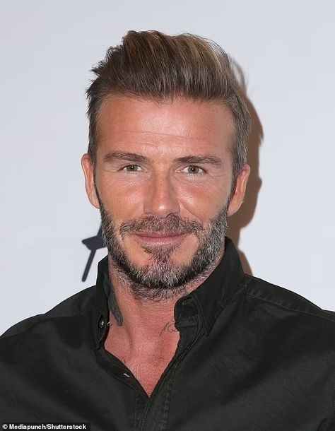 Blend it like Becks: As fans mock ex-England captain for his questionably dyed facial hair, MailOnline looks back at David Beckham's most iconic styles | Daily Mail Online Beckham Hair, Deni Denials, Victoria And David, Bouffant Hair, Netflix Documentaries, After Pictures, Hair Starting, High Ponytails, Hair Transplant