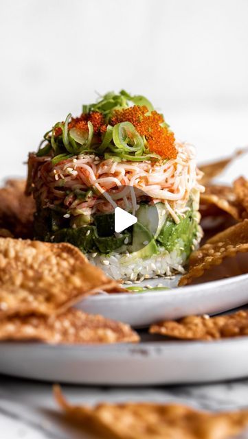 Kylie Mazon-Chambers on Instagram: "This California roll sushi-inspired appetizer is made with kani, imitation crab meat salad, paired with diced avocado, and cucumber with crispy wontons for scooping.

The full recipe with ingredients & instructions is on my site, cookingwithcocktailrings.com or you can head over to the link in my bio!" Crab Salad Roll, Sushi Rolls With Crab Meat, Sushi Stacks Recipe, Crab Salad Recipe Sushi, Crab Kani Salad, Crispy Wontons, Sushi Stack, Cooked Sushi, Crab Meat Salad