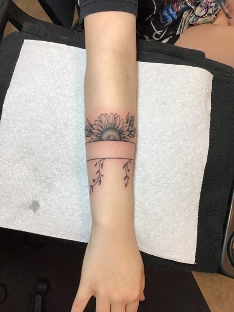 Sunflower Band Tattoo, Sunflower With Writing Tattoo, Sunflower Arm Band Tattoo, Sunflower Wrap Around Tattoo, Flower Band Tattoo Design, Wrist Band Tattoo, Wrap Around Tattoo, Country Tattoos, Cuff Tattoo